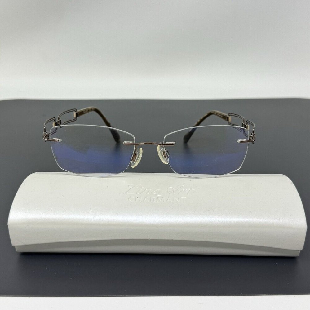 Charmant Line Art XL 2020 BR 50-17-135 Brown Rimless Metal Eyeglasses Frame